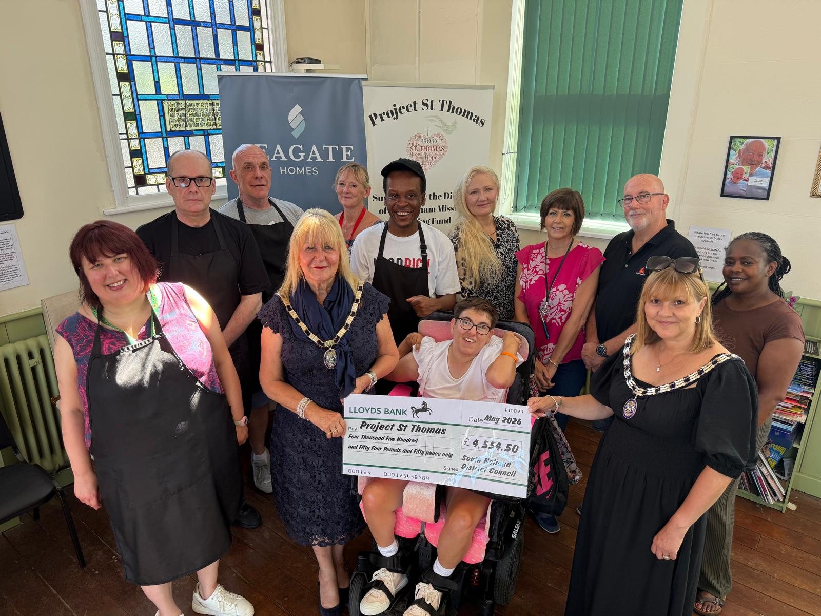 Project St Thomas volunteers and supporters celebrating community funding